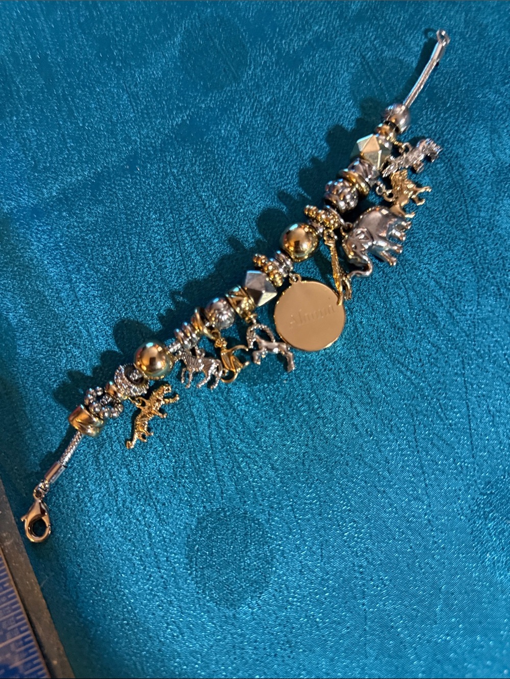 Gold and Silver Charm Bracelet with Animal Pendants